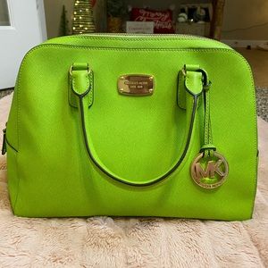 Michael kors handbag with matching wallet.